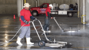 The Area's Top Provider Of Quality Parking Garage Cleaning & Maintenance Services. Parking Garages should be cleaned in the Northeast at least once a year, and in high traffic garages twice a year, due to the salts and other contaminants that get into the garage surfaces. They eventually get absorbed into the concrete parking surfaces and soon will cause the rebar to rot out. When this happens the concrete begins to leak,crack and in the worse case scenario the garage itself can be condemned. We use state of the art hot and cold water powerwashing machines ranging up to 4000 PSI with up to 200+ degree water, surface machines and any cleaning solutions needed for all parking garage cleaning. Our knowledgeable staff is experienced on how to lighten or when possible remove stains completely. Each Parking Garage cleaning is approached based upon the existing conditions, and we will use the correct products and methods specific to your facility's cleaning and maintenance requirements.